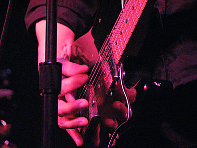 Marth Davis plays Guitar